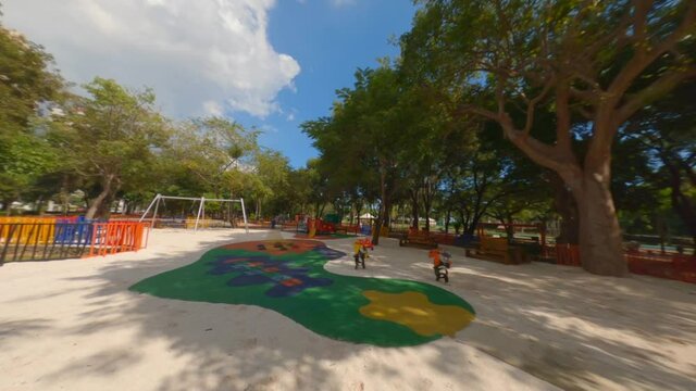 FPV Flight At Empty Playground On a Sunny Summer Day In Dominican Republic. - aerial