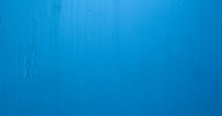 Blue concrete wall picture. Interesting concrete wall texture. Background for product design and placement.
