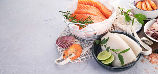 Fresh seafood arrangement on light background.