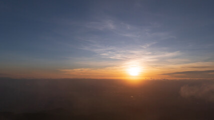 Fototapeta na wymiar Bright orange sky and light of the sunrise at morning.