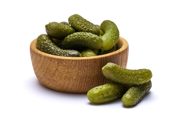 Bowl of Tasty canned Whole green cornichons isolated on a white background
