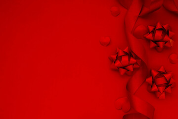 赤い背景とリボンの愛情とプレゼントのイメージ