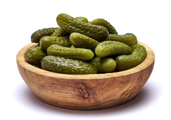 Bowl of Tasty canned Whole green cornichons isolated on a white background