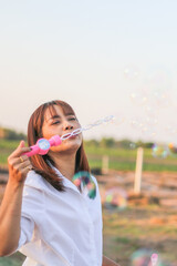 woman, bubble, blow, asia, garden, outdoor, thai, blowing, beauty, spring, beautiful, female, attractive, young, grass, park, fun, happy, cheerful, girl, adult, wind, cute, eyes, summer, joy, brunette