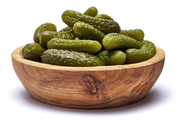 Bowl of Tasty canned Whole green cornichons isolated on a white background