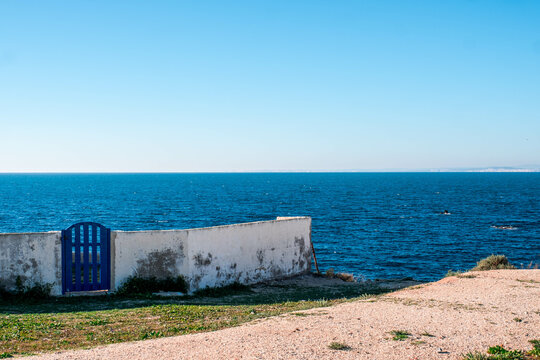 An abandoned house on the edge of the cliff on the old island of Tabarca, in the Spanish Mediterranean, in front of Santa Pola, Alicante