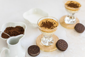 Whipped special coffee drink in a cup with milk, top view
