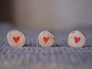 words of love and heart on wooden saw cuts