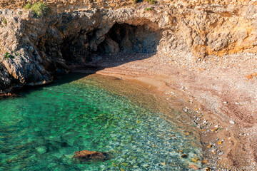 The cave of the sea lion in a cliff of the old island of Tabarca, in the Spanish Mediterranean, in front of Santa Pola, Alicante