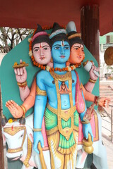 Obraz premium Indian god sculpture - Brahma, Vishnu and Shiva in one.