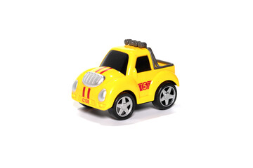 Children yelow toy car isolated on white.