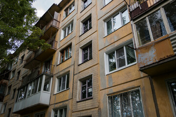 Fototapeta na wymiar Soviet apartment building. Apartment block. Soviet architecture. Concrete apartment building. Dark architecture. Ust-Kamenogorsk (kazakhstan)