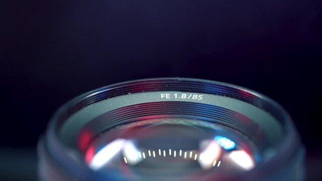 Closeup of popular Sony 85mm f1.8 lens. Professional photography equipment, scenic studio shot