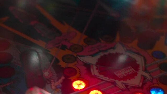 Close up on Pinball Machine Flashing Lights and Parts 2