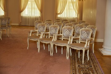 The chairs are in the registry office 
