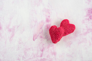 heart shaped jelly candy sweet on pink background