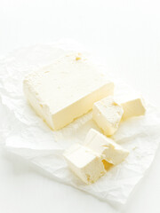 Cream butter on white