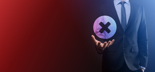 Hand holds icon,cancellation symbol,cancel icon.Cross mark flat red icon.round X mark.cancel...