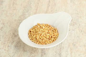 Crunched roasted peanut in the bowl