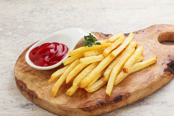 French fried potato over board