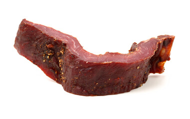 Slices of beef jerky on white background
