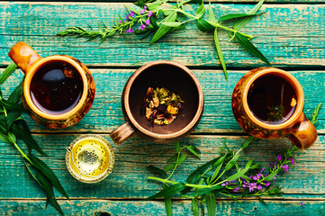 fireweed tea,rustic wooden table