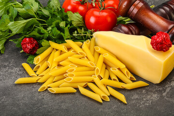 Raw penne rigate for cooking