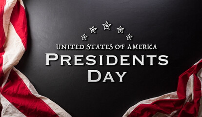 Happy presidents day concept made from flag of the United States and the text on dark  background.