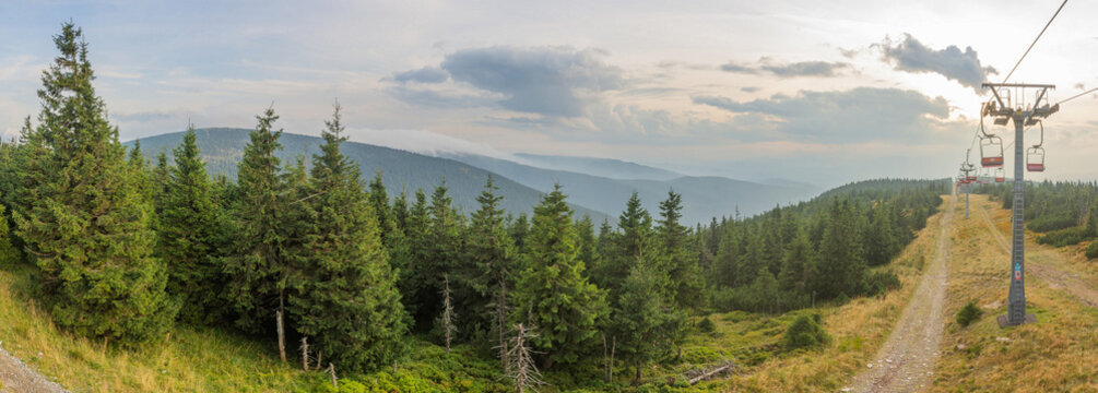 Road under the chairlift from Ramzova to peak Serak in Jeseniky mountains in Czech Republic