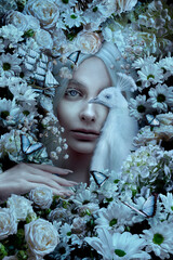 Beautiful albino woman portrait with peacock and flowers.