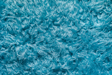 Obraz na płótnie Canvas Artificial fur is blue. photo of the texture of the fabric.