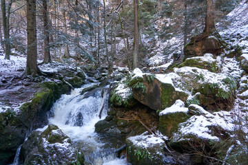 famous ravenna gorge, ravenna waterfall and wild river in the black forest in winter in breitnau...