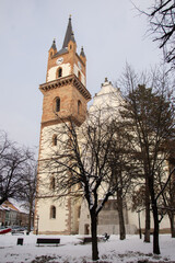 Fototapeta na wymiar Romania, Evangelical Church Tower in Bistrita ,January 2022