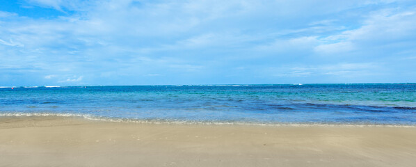 Travel background with Caribbean sea and clouds sky .