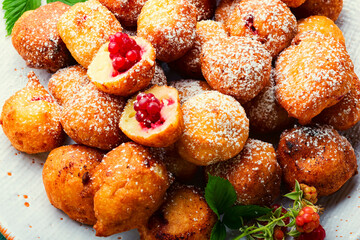 Cottage cheese donuts with raspberries