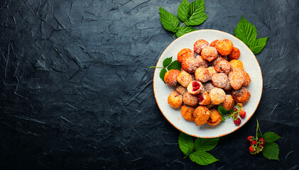 Curd donuts with raspberries,copy space