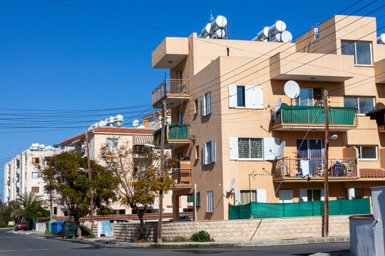 New modern flat apartment architecture buildings in Paphos (Pafos) on the Mediterranean island of Cyprus which is a popular tourist holiday travel destination resort, stock photo image