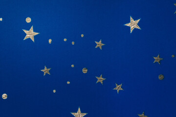 Metal stars and circles on blue background