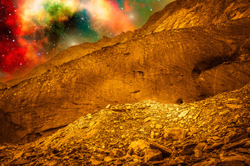 Fantasy golden landscape, photomontage panorama of a surface of another planet. Fantasy image of mountains from another planet under a space sky