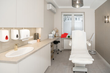 Cosmetologist's or dermatologist's office with professional comfortable furniture and equipment for cosmetic procedures