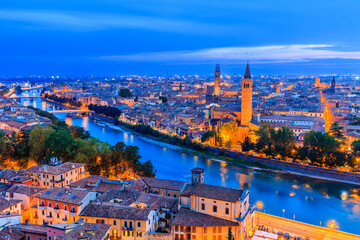 Fototapeta na wymiar Verona, Italy. View of Verona old town and Adige river at dusk.