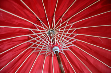 red umbrella on black background