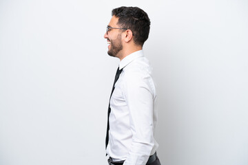 Fototapeta premium Business Brazilian man isolated on white background laughing in lateral position