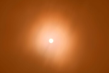 Sun during a sandstorm in the desert.
