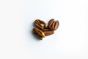 Pecan nuts isolated on white background