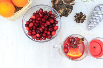 Beautiful fragrant hot drink with cranberries and spices. Christmas or autumn mood.