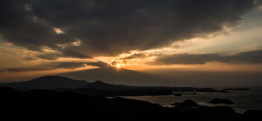 夕日、島