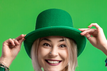 St. Patrick's Day. Beautiful smiling woman wearing green hat