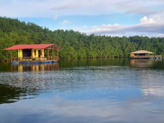 View of a river water and floating house in Sungai Lebam, Kota Tinggi, Johor, Malaysia.