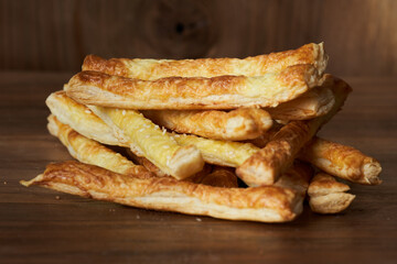 Cheese crackers on wooden board